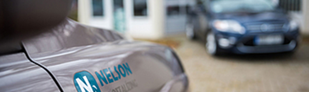 Car branded with the logo of the company Nelson. Nelson ltd. uses e-invoicing via EDI from EDITEL.